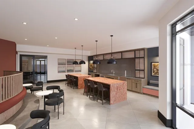 a view of an empty room with a window and fire place