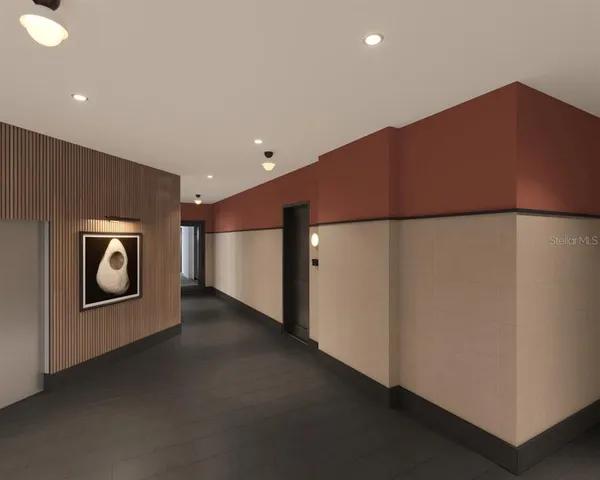 a living room with furniture kitchen view and a wooden floor