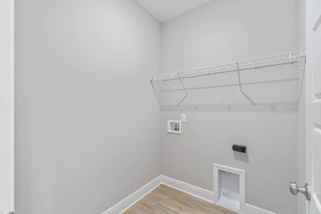 a view of a room with racks on the wall