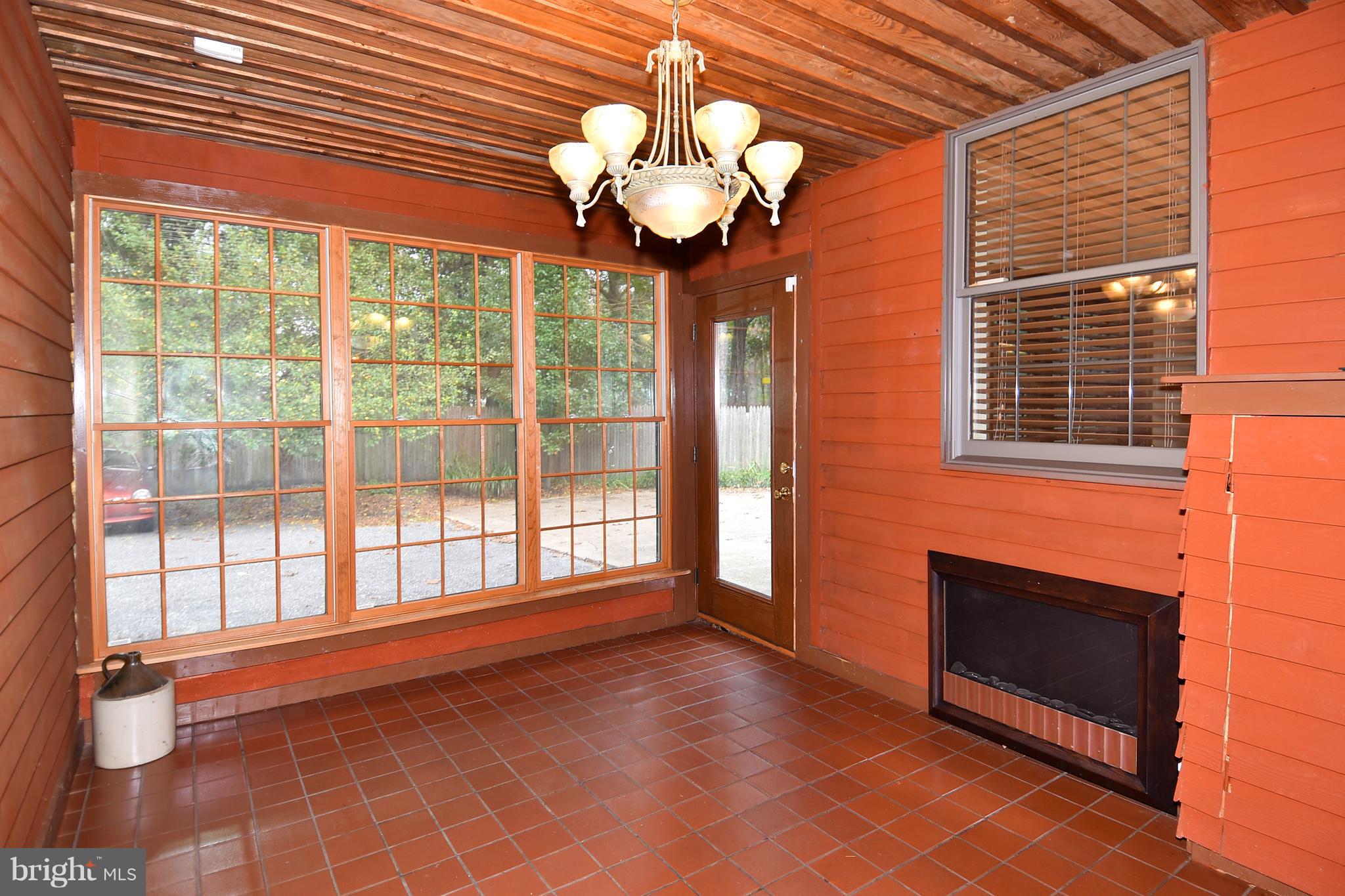 878 Sycamore Hill Road Severn, MD 21144 - Photo 3 of 29 SIDE ENTRANCE FOYER WITH ELECTRIC FIREPLACE