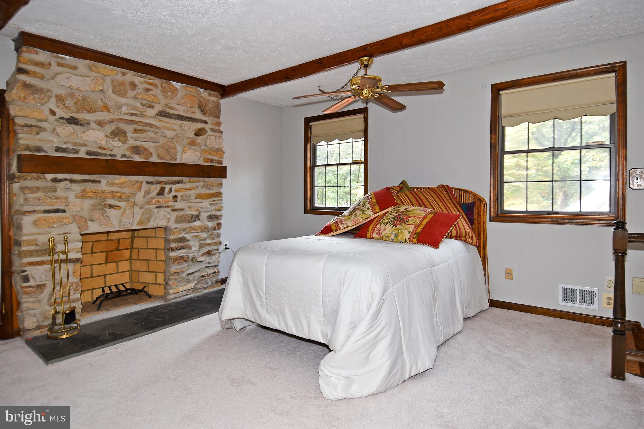 878 Sycamore Hill Road Severn, MD 21144 - Photo 21 of 29 UPPER LEVEL BEDROOM HAS CEILING FAN AND 2 WINDOWS