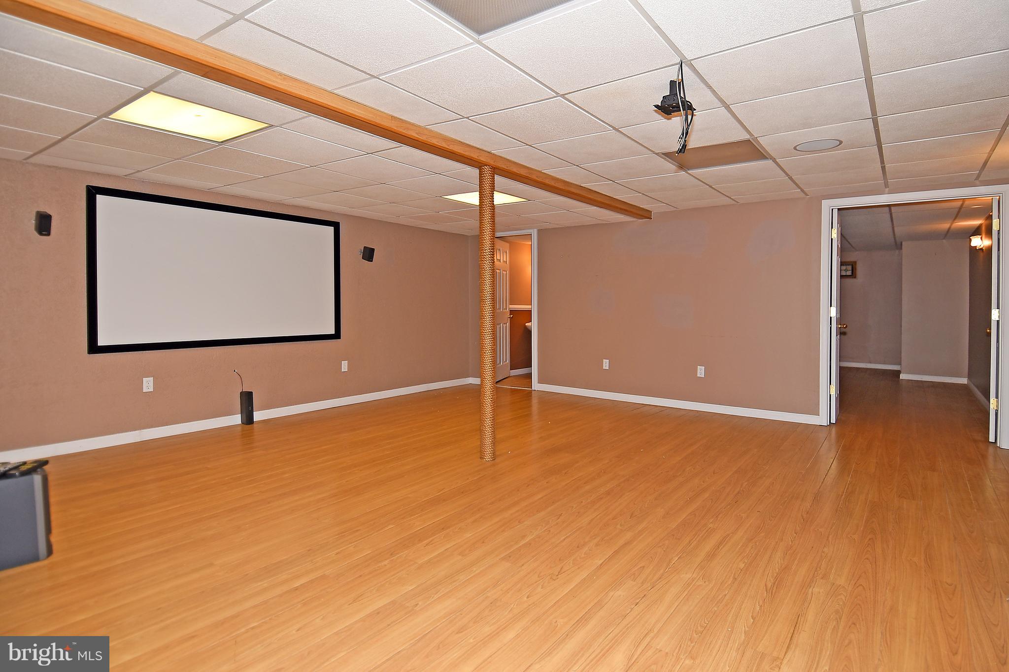 878 Sycamore Hill Road Severn, MD 21144 - Photo 24 of 29 LOWER LEVEL WIRED THEATER RM ALSO HAS POWDER RM