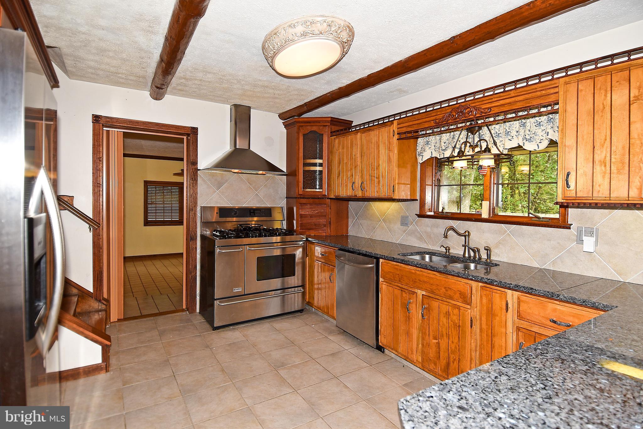 878 Sycamore Hill Road Severn, MD 21144 - Photo 6 of 29 STOVE RANGE HAS 5 BURNER TOP AND DUAL OVENS