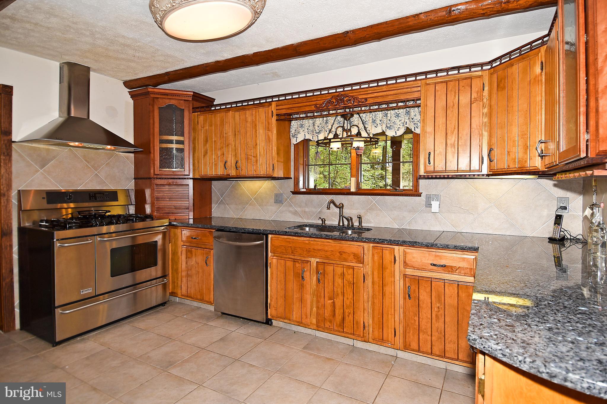 878 Sycamore Hill Road Severn, MD 21144 - Photo 7 of 29 KITCHEN HAS GRANITE COUNTER TOPS