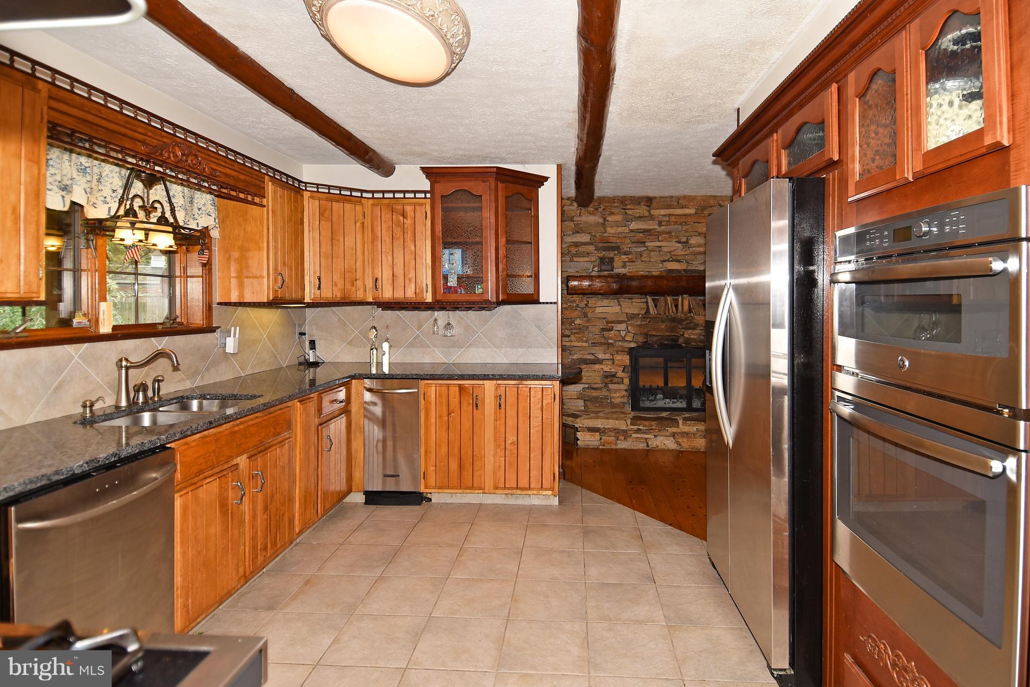 878 Sycamore Hill Road Severn, MD 21144 - Photo 8 of 29 KITCHEN HAS CERAMIC TILE FLOORS