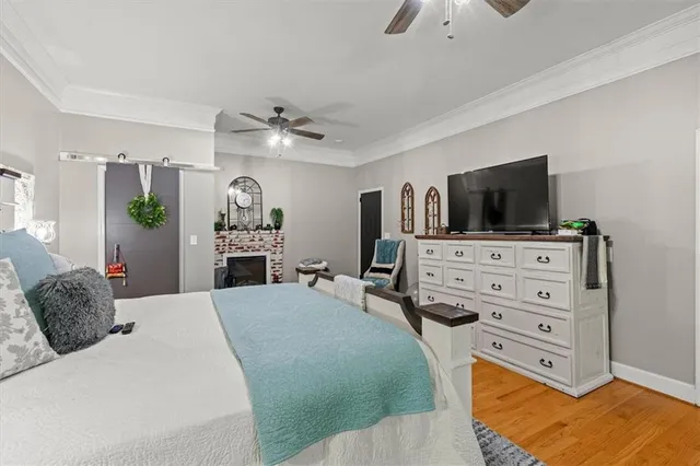 a outdoor space with patio couch and a fireplace