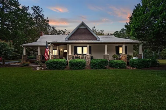a backyard of a house with lots of green space