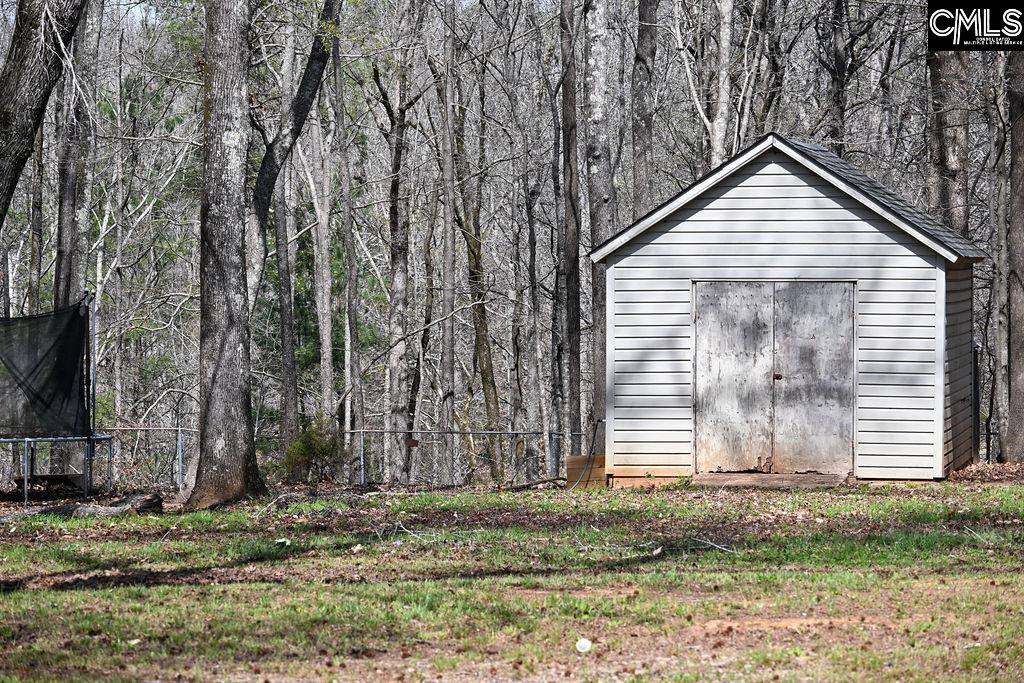 88 Running Deer Road Blythewood, SC 29016 - Photo 21 of 24 a view of a house with a yard