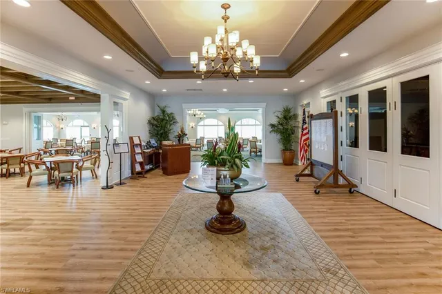 a view of a lobby room with gym equipment