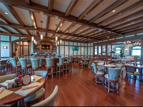 a outdoor space with lots of furniture and lots of wooden furniture