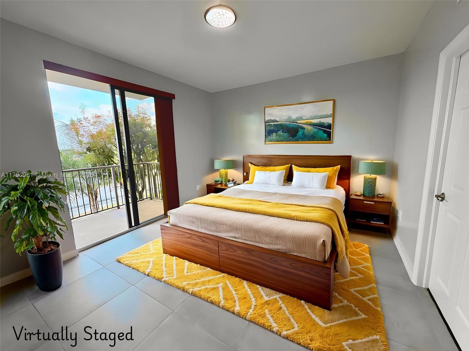 8440 Southwest 8th Street, Unit 304A Miami, FL 33144 - Photo 12 of 21 a bedroom with a bed and a large window