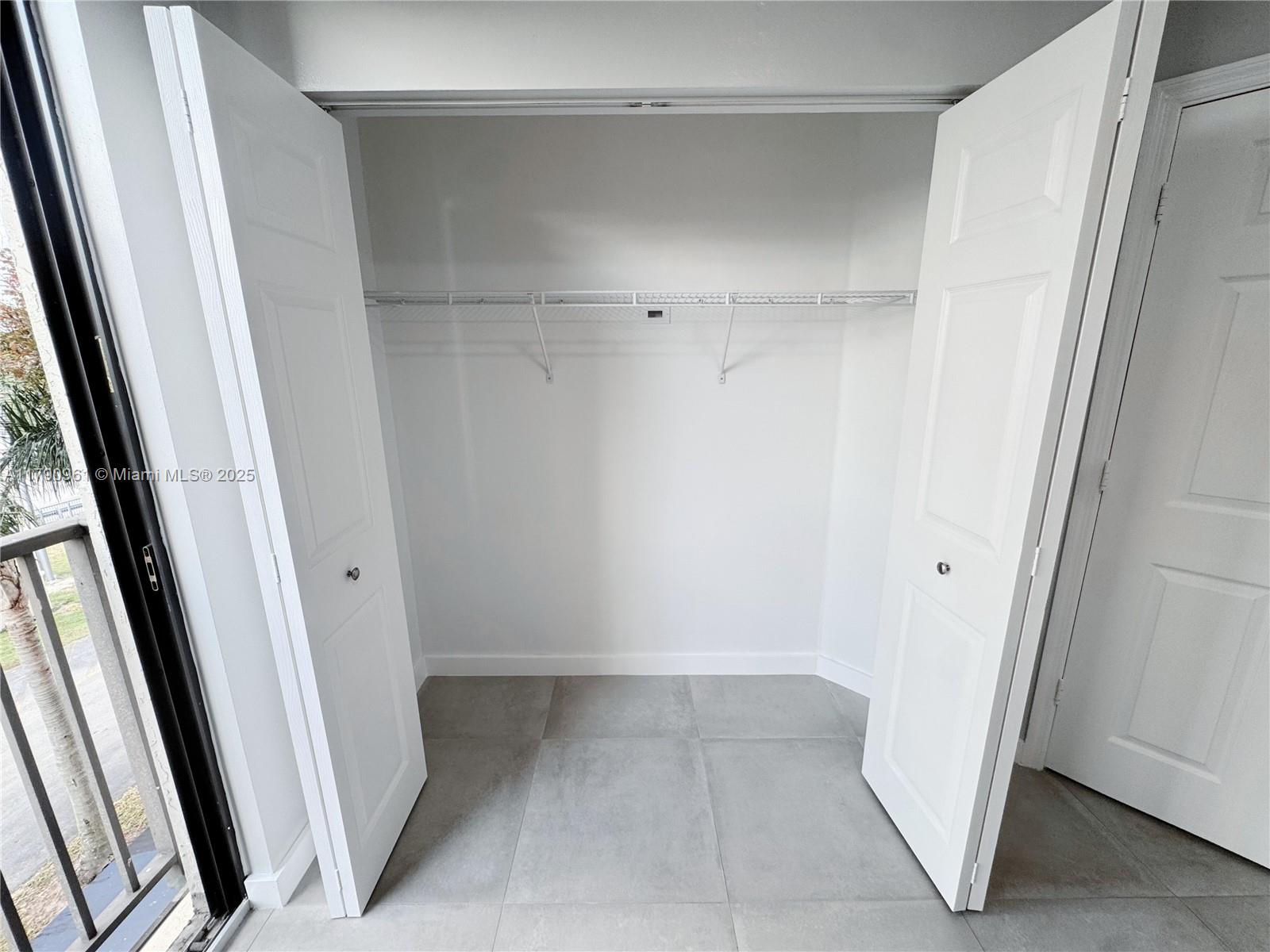 8440 Southwest 8th Street, Unit 304A Miami, FL 33144 - Photo 18 of 21 a view of closet