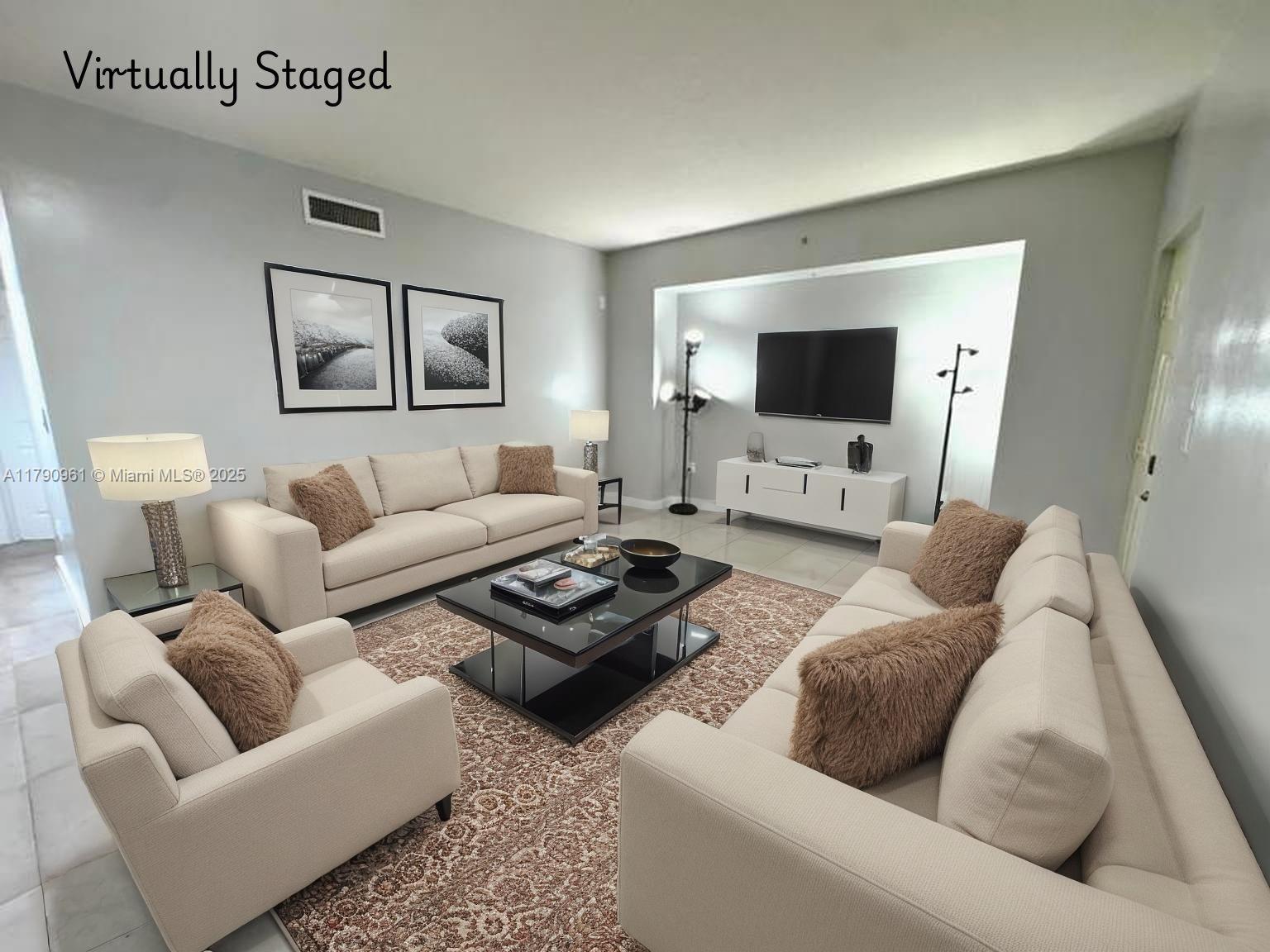 8440 Southwest 8th Street, Unit 304A Miami, FL 33144 - Photo 4 of 21 a living room with furniture and a flat screen tv