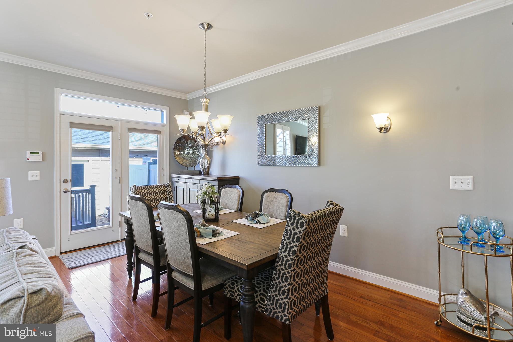 3025 Stoner's Ford Way Frederick, MD 21701 - Photo 6 of 38 Dining area to French doors to rear patio
