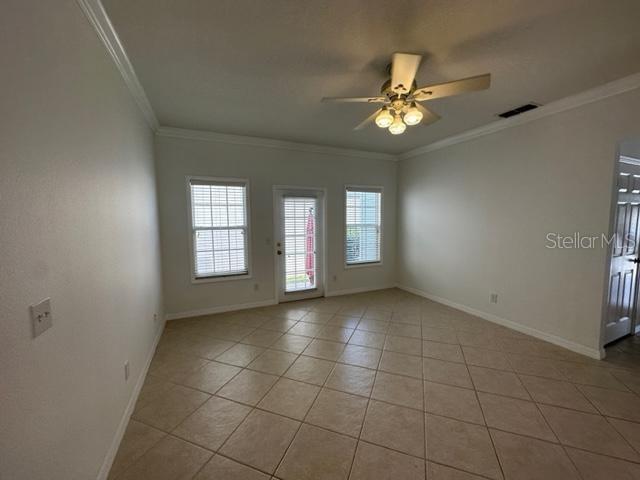 1005 Wiregrass Street Celebration, FL 34747 - Photo 11 of 31 a view of an empty room with a window