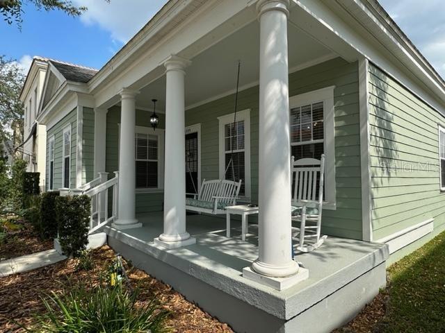 1005 Wiregrass Street Celebration, FL 34747 - Photo 2 of 31 a view of the house with entrance gate