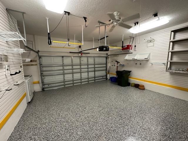 1005 Wiregrass Street Celebration, FL 34747 - Photo 27 of 31 a utility room with cabinets