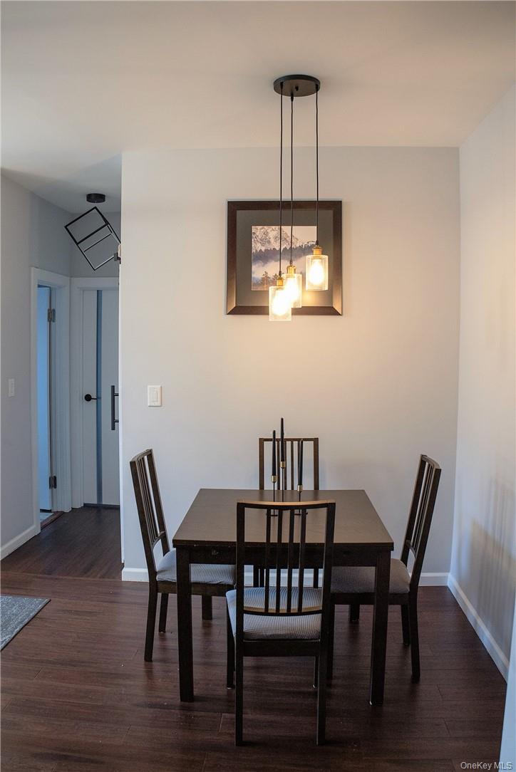663 Locust Street, Unit 3G Mount Vernon, NY 10552 - Photo 5 of 13 a view of a dining room with a table and chairs
