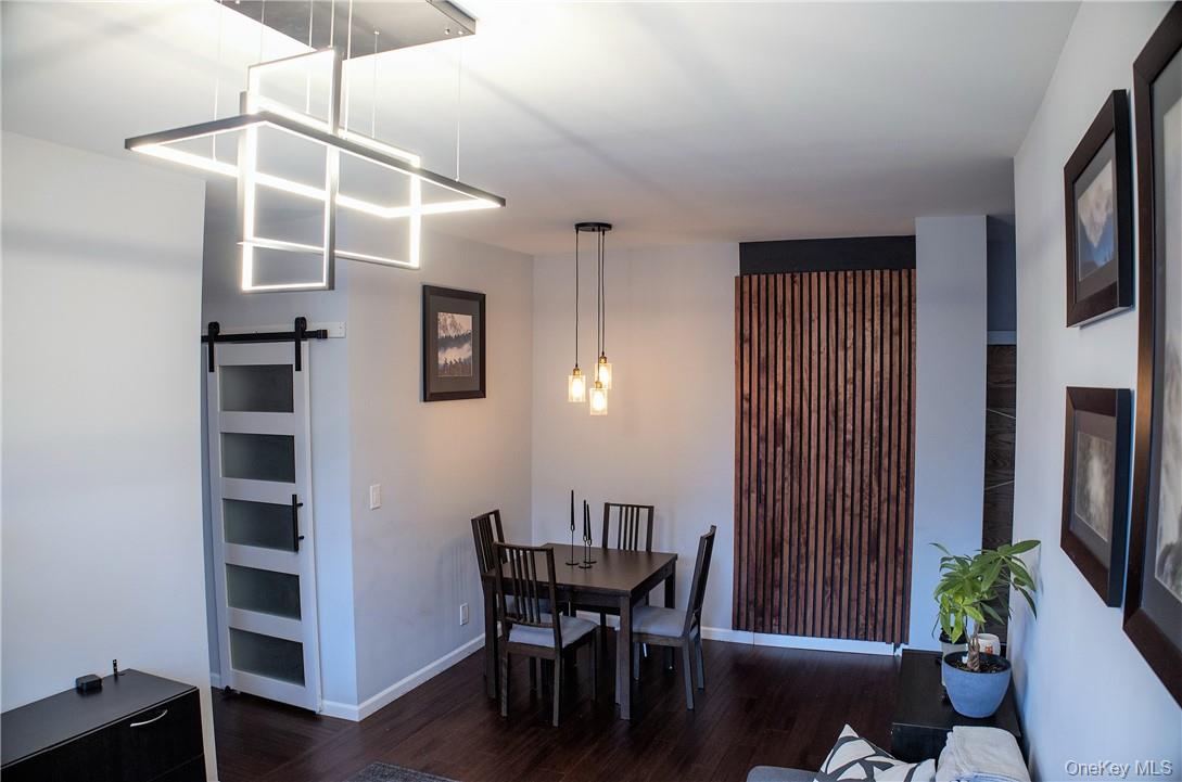 663 Locust Street, Unit 3G Mount Vernon, NY 10552 - Photo 6 of 13 a view of a dining room with furniture and wooden floor