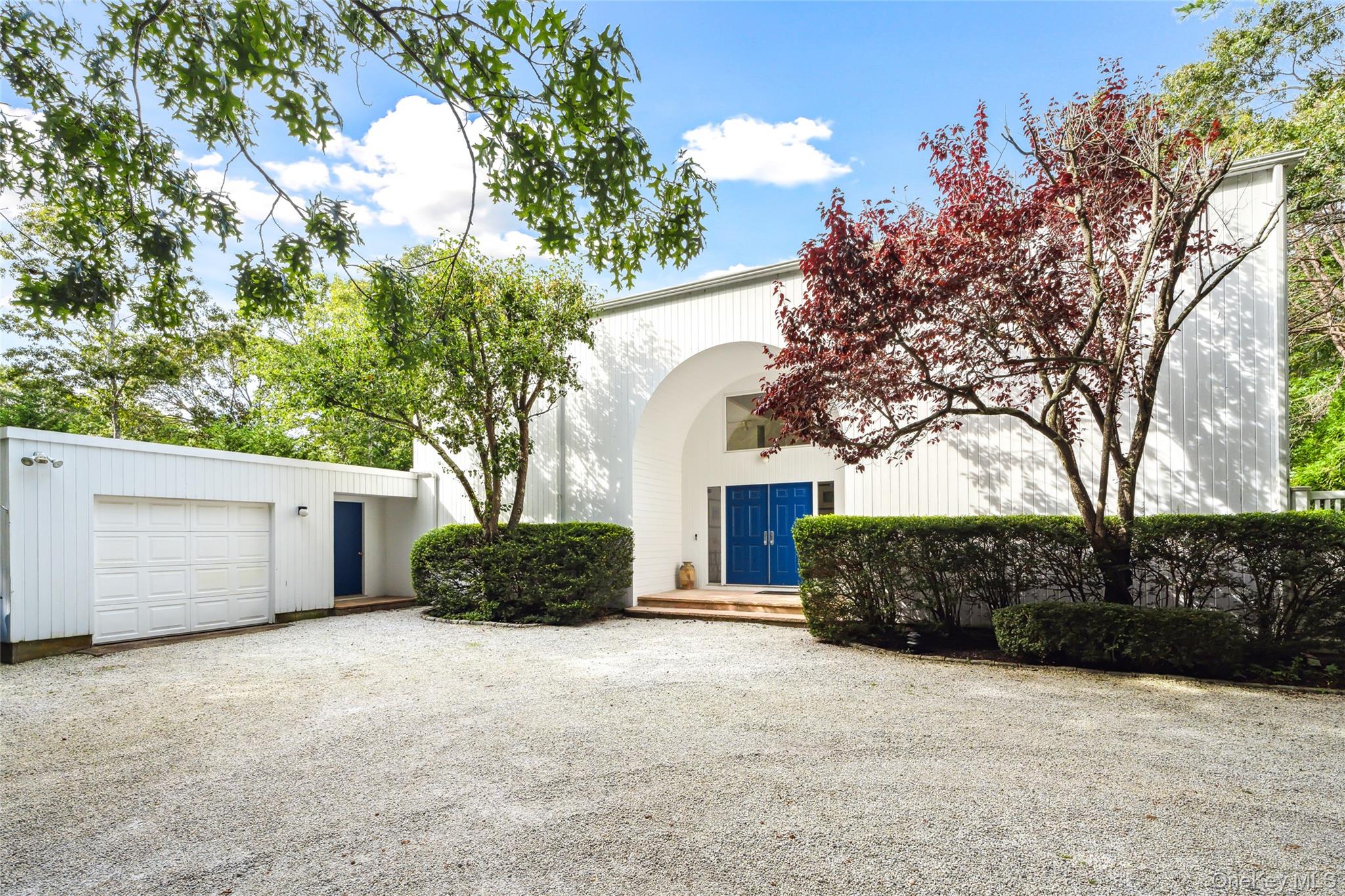 30 Pheasant Run Quogue, NY 11959 - Photo 26 of 26 a house view with a outdoor space