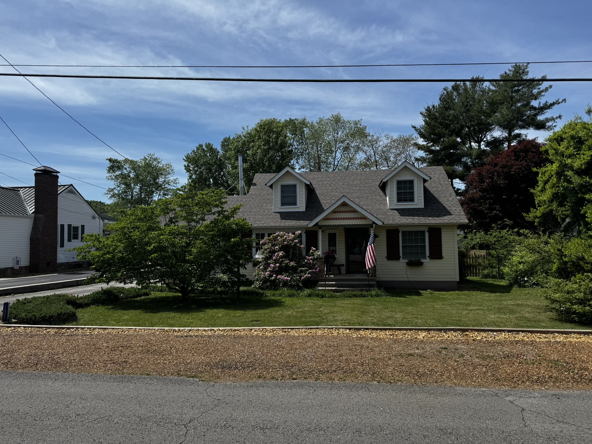 105 Wilson Street Cowan, TN 37318 - Photo 1 of 57 a front view of a house with a garden