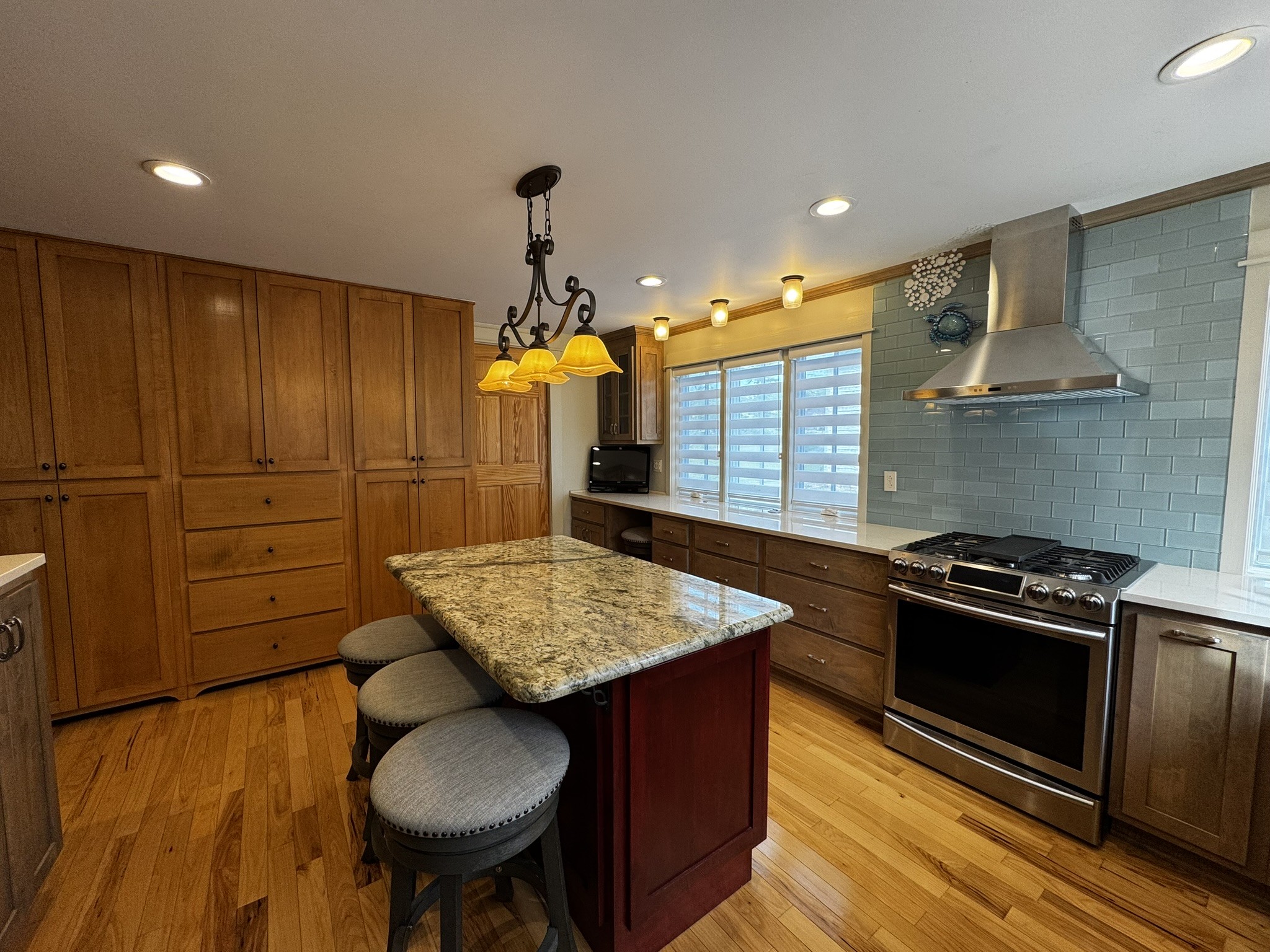 105 Wilson Street Cowan, TN 37318 - Photo 11 of 57 a kitchen with a stove and a refrigerator