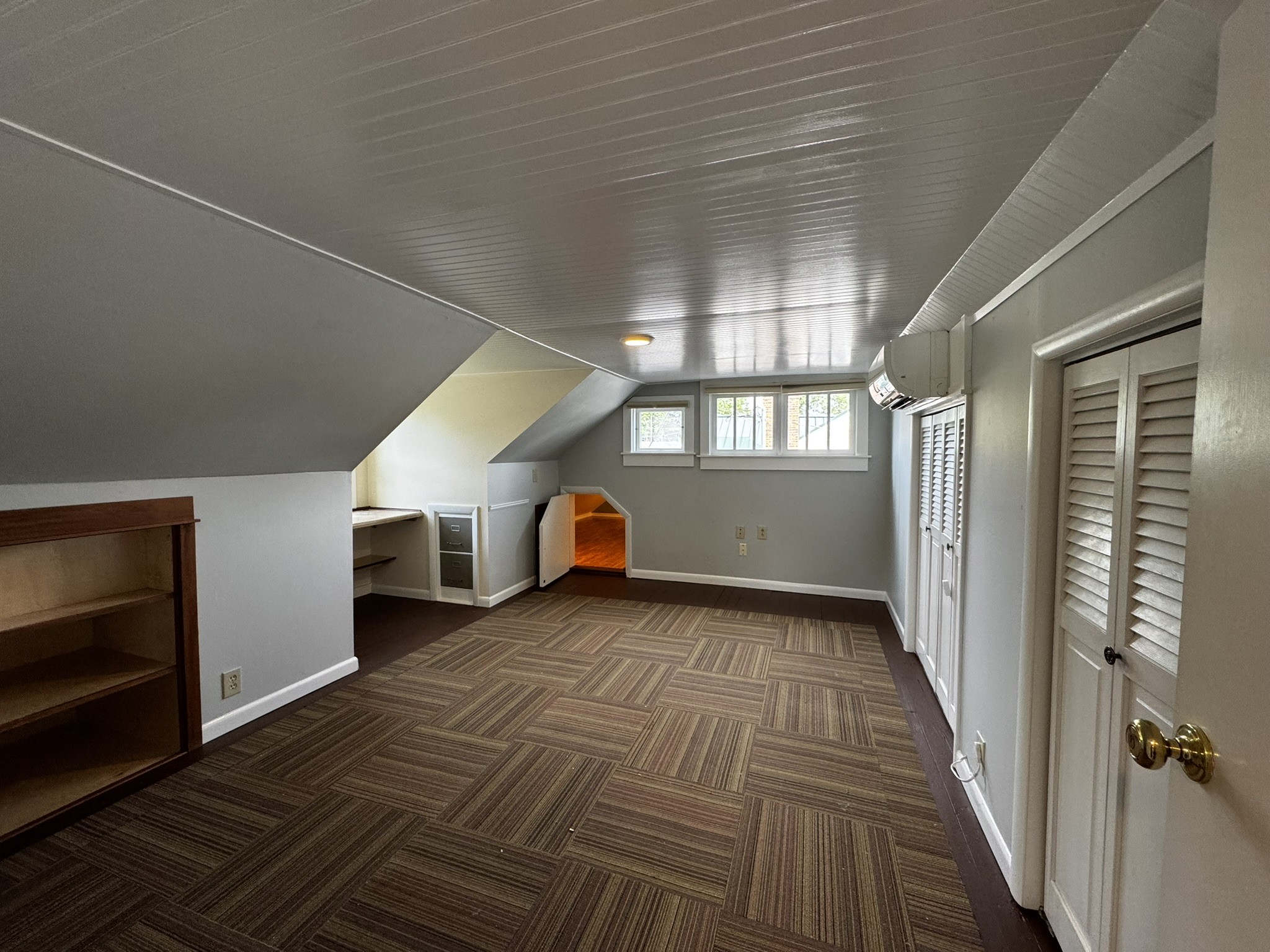 105 Wilson Street Cowan, TN 37318 - Photo 19 of 57 a view of a hallway with wooden floor and staircase