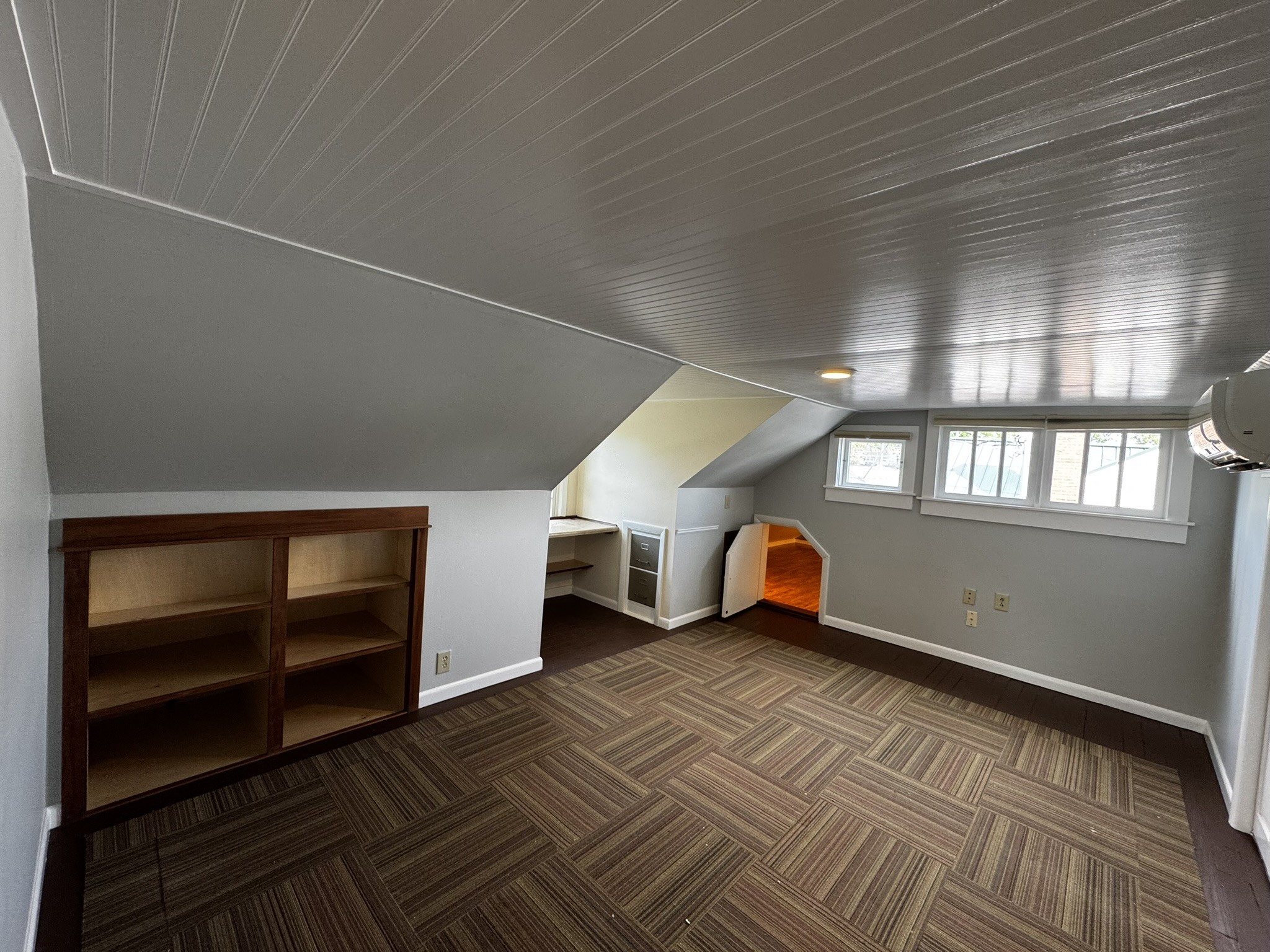 105 Wilson Street Cowan, TN 37318 - Photo 20 of 57 a room with wooden floor and windows