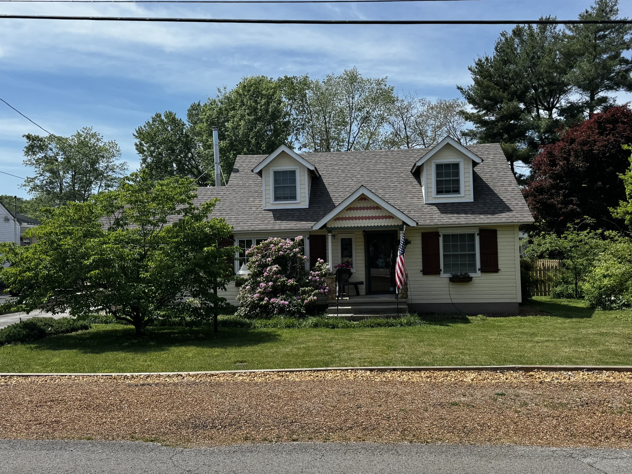 105 Wilson Street Cowan, TN 37318 - Photo 2 of 57 a front view of a house with a yard