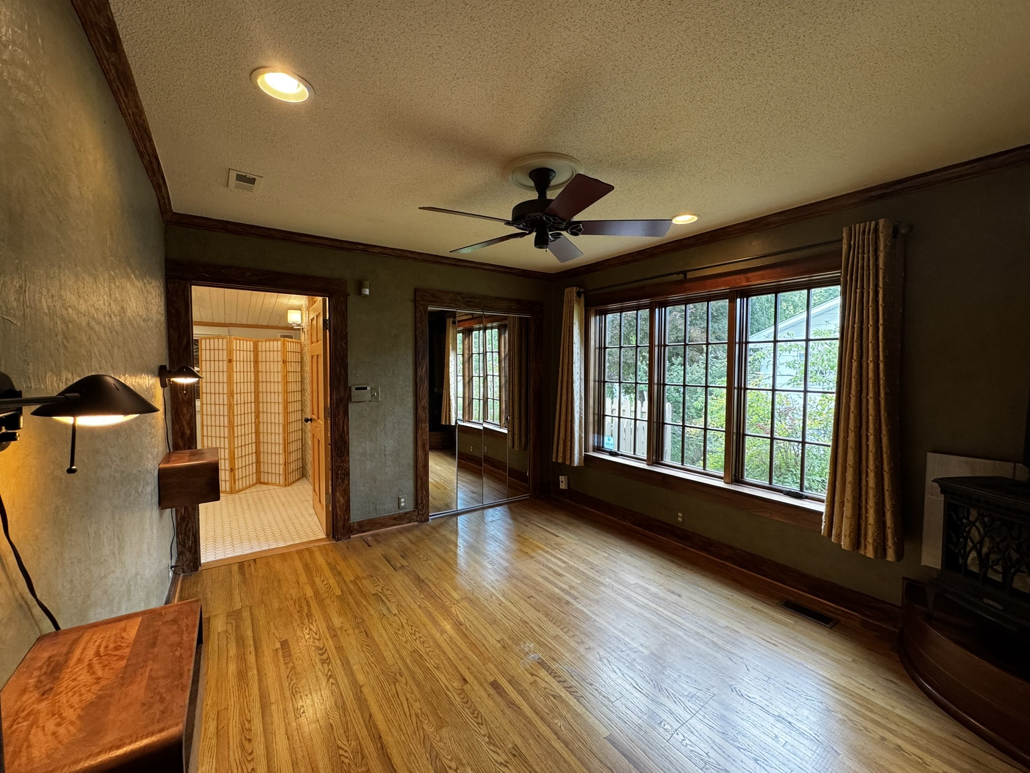 105 Wilson Street Cowan, TN 37318 - Photo 27 of 57 a view of an empty room with window and wooden floor