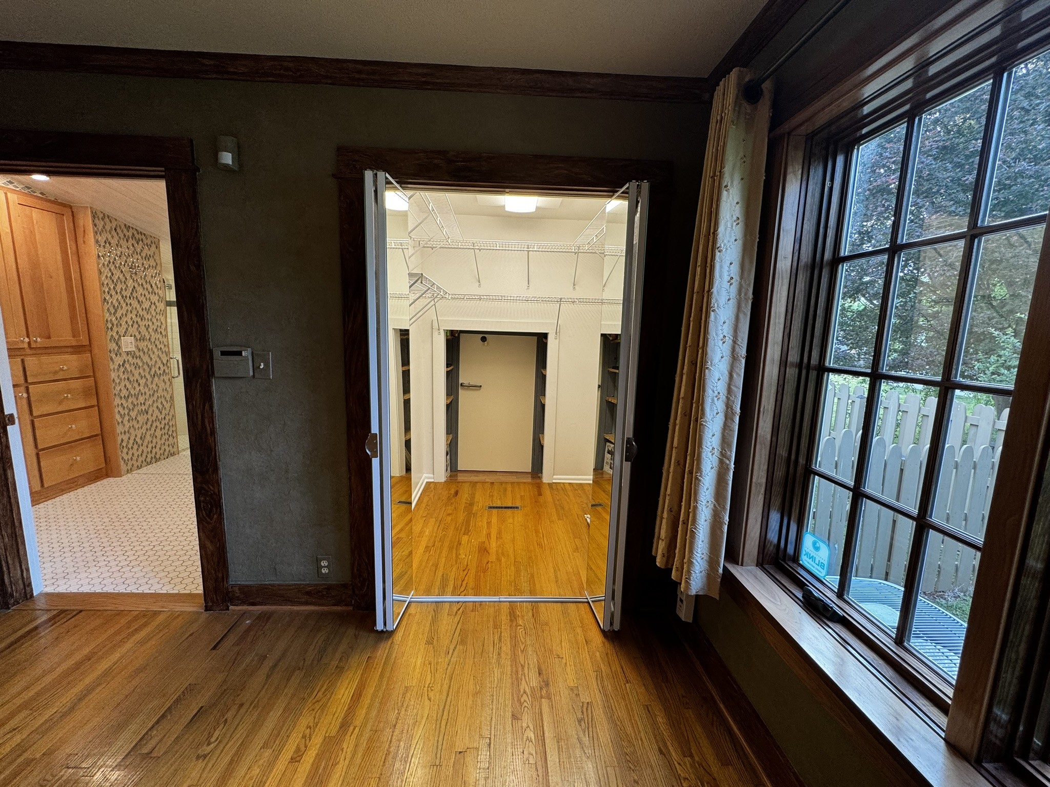 105 Wilson Street Cowan, TN 37318 - Photo 28 of 57 a view of empty room with wooden floor and fan