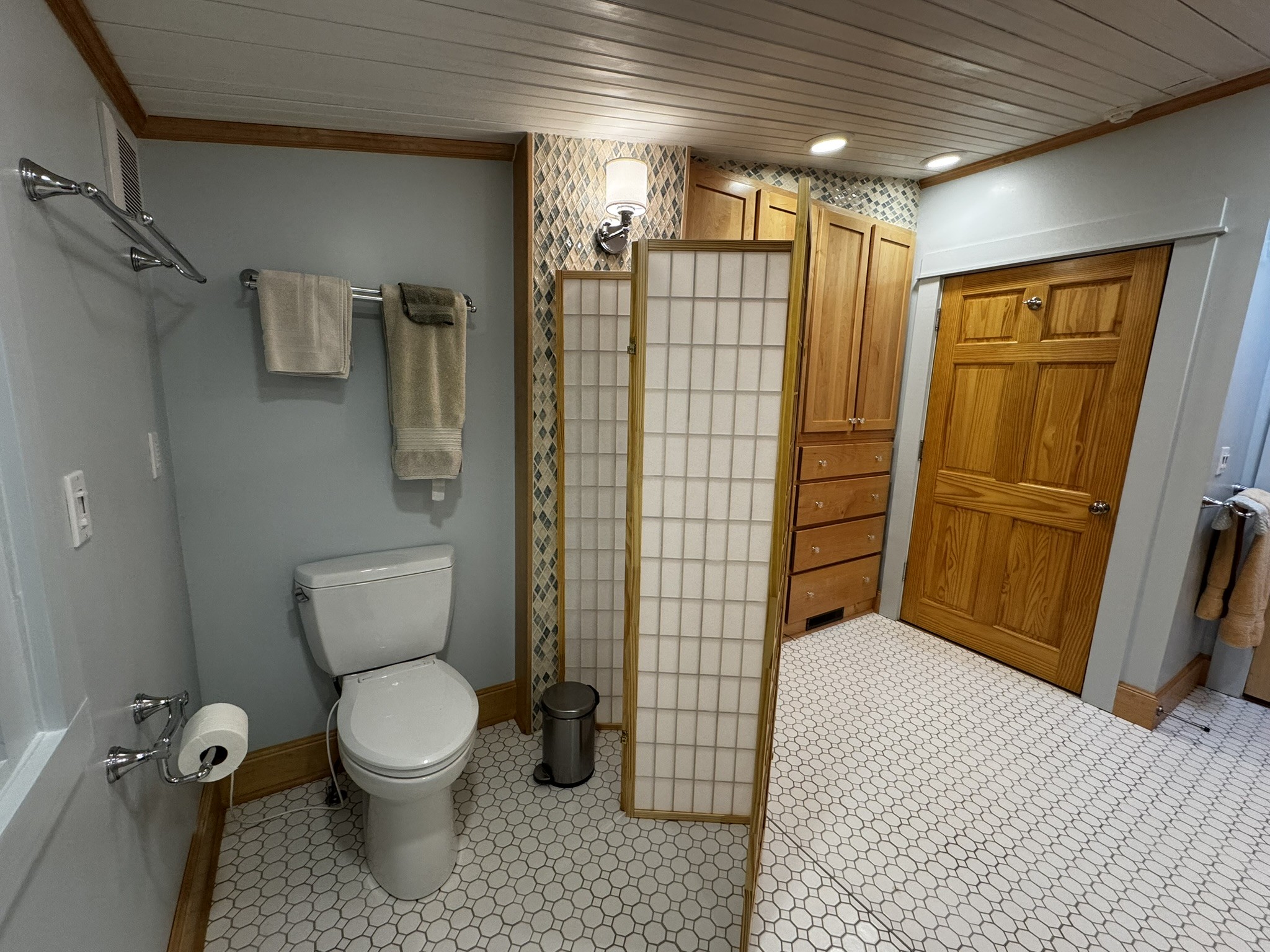 105 Wilson Street Cowan, TN 37318 - Photo 33 of 57 a bathroom with a toilet and shower