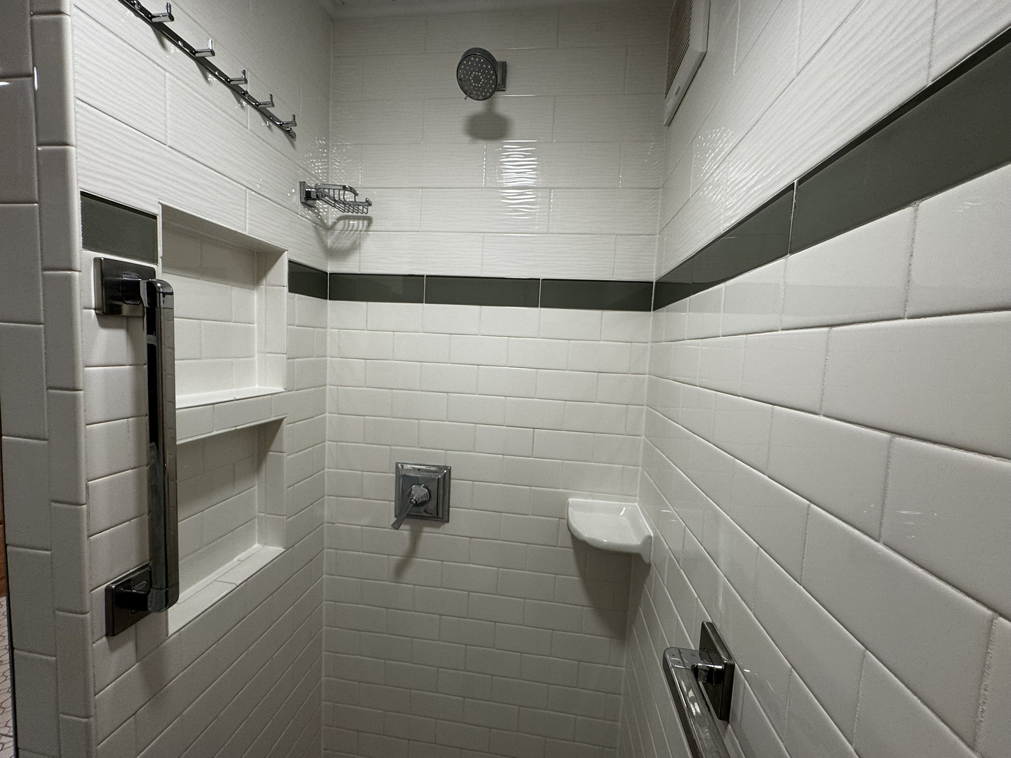 105 Wilson Street Cowan, TN 37318 - Photo 38 of 57 a bathroom with a toilet and a shower