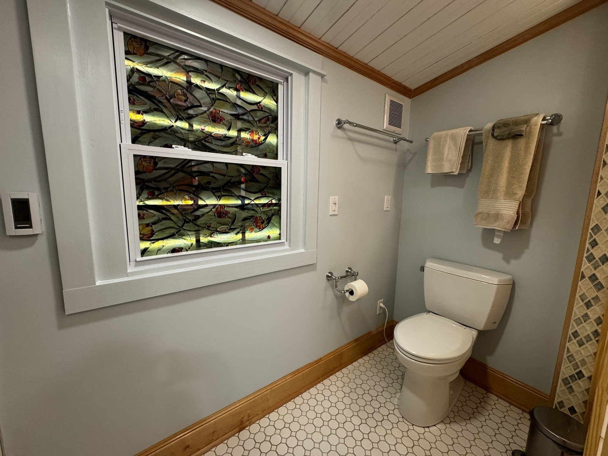 105 Wilson Street Cowan, TN 37318 - Photo 39 of 57 a white toilet sitting next to a window