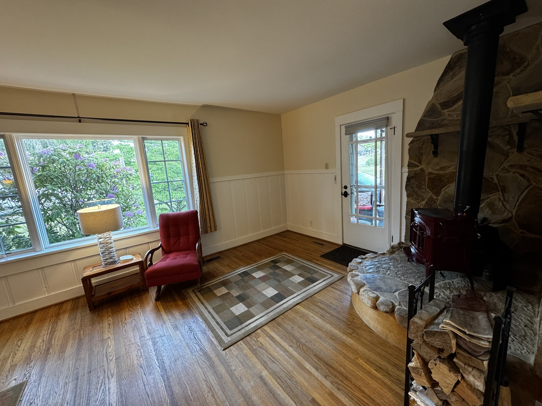 105 Wilson Street Cowan, TN 37318 - Photo 41 of 57 a living room with furniture and a wooden floor