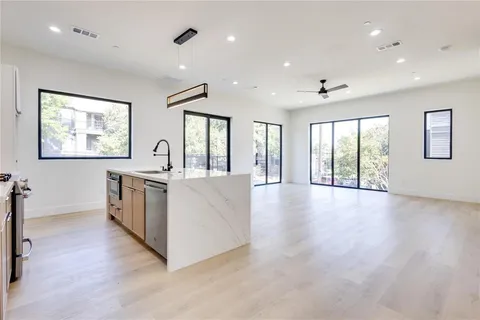 a large white room with a large window