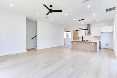a view of kitchen with wooden floor and window