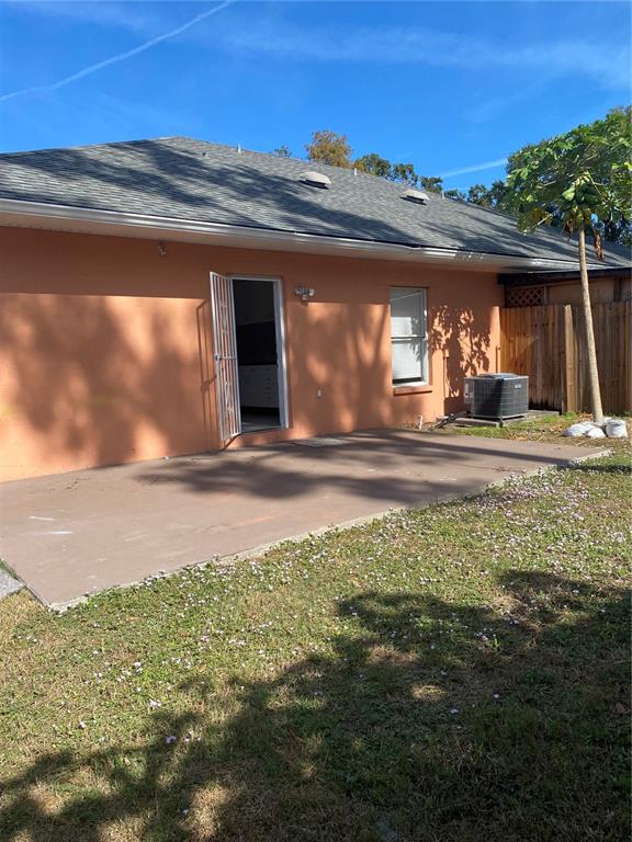 3336 West Heiter Street Tampa, FL 33607 - Photo 5 of 5 a front view of a house with a yard