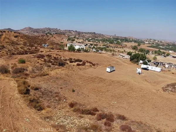 a view of an ocean & house