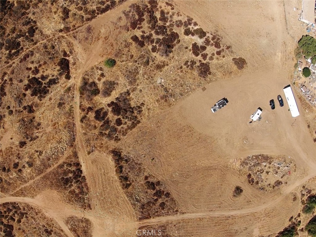 0 Campos Road Perris, CA 92570 - Photo 10 of 17 a bathroom with a bathtub and a shower curtain