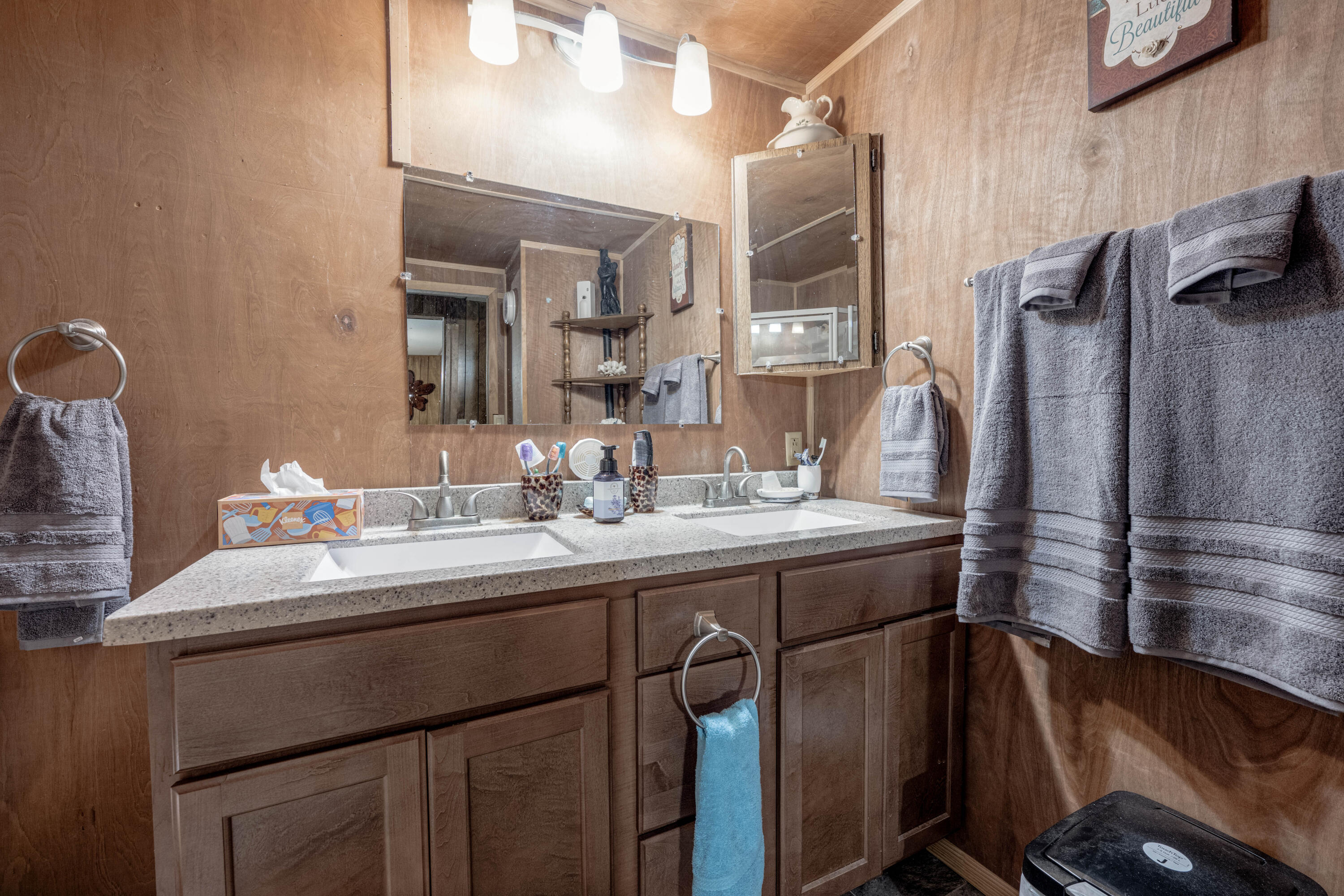 248 Bunny Lane Freeport, FL 32439 - Photo 13 of 27 a bathroom with a sink and a mirror