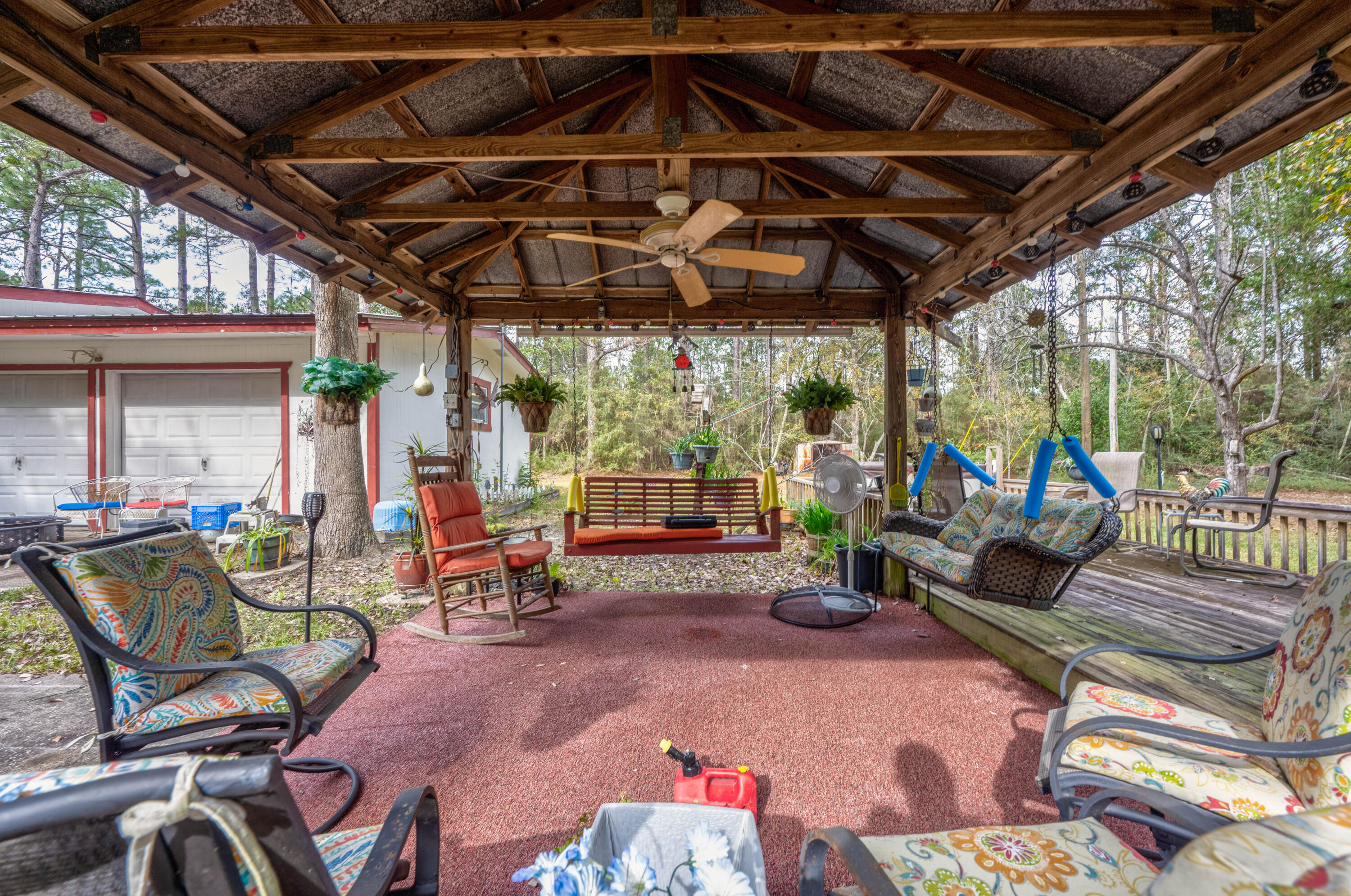 248 Bunny Lane Freeport, FL 32439 - Photo 26 of 27 a view of a chairs and table in patio