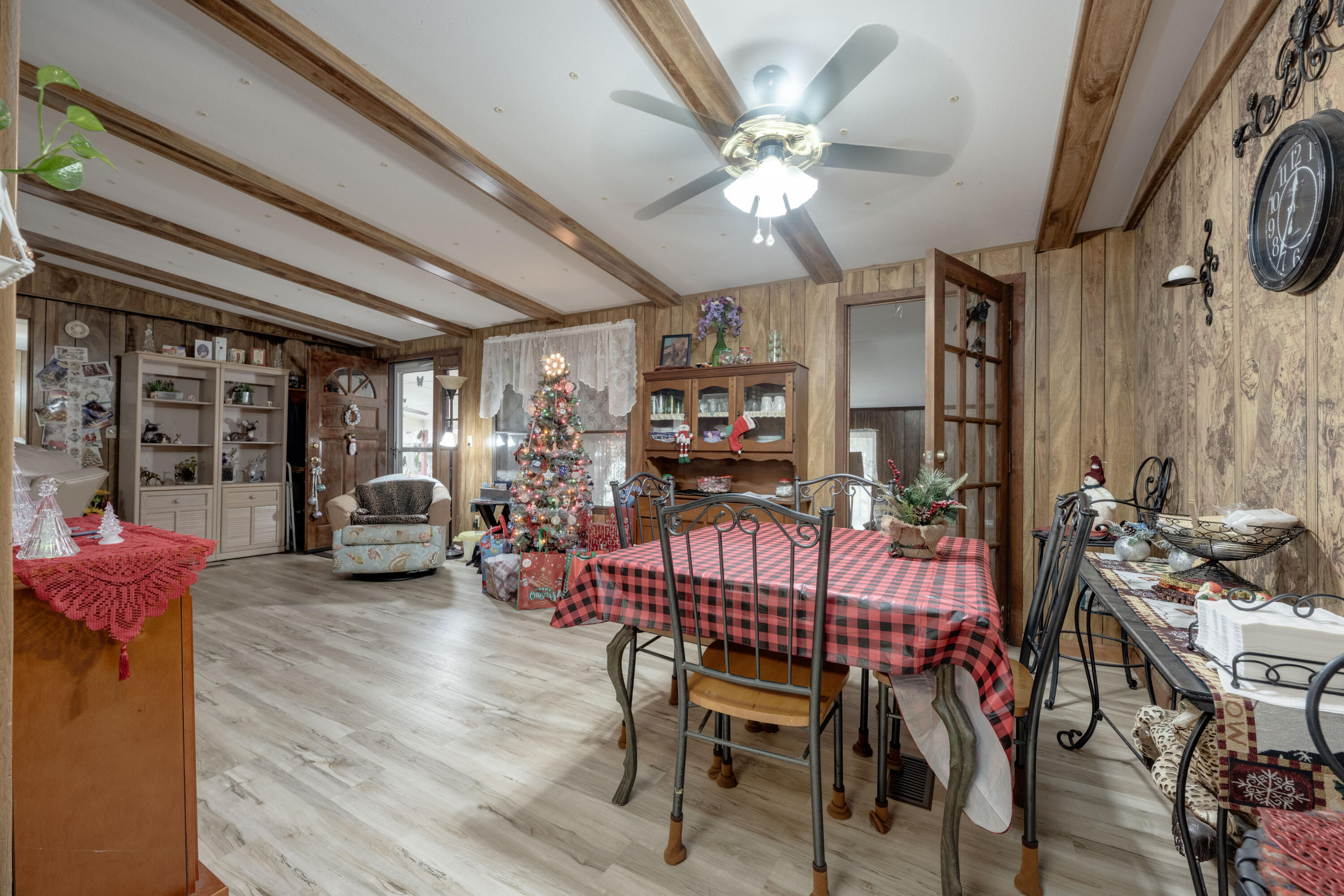 248 Bunny Lane Freeport, FL 32439 - Photo 10 of 27 a view of a dining room with furniture and chandelier