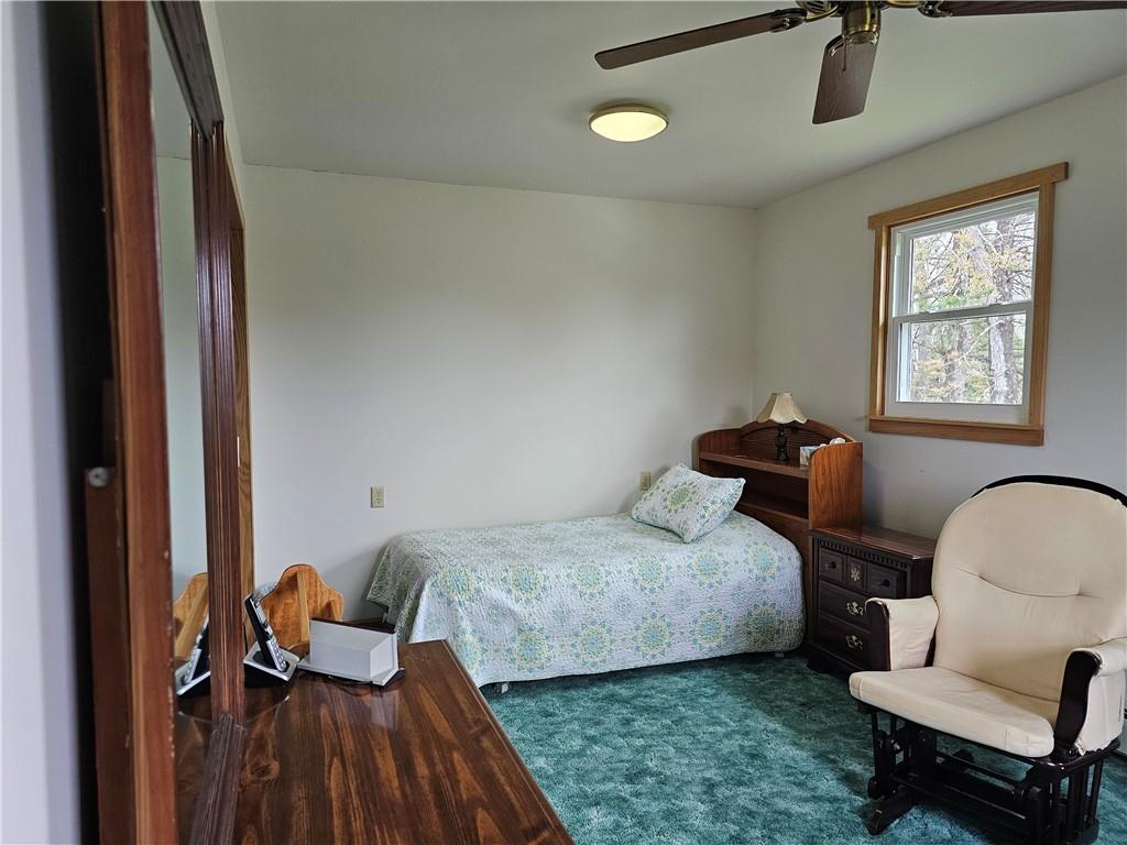 1903 Sandy Lake-Grove City Road Jackson Center, PA 16133 - Photo 12 of 24 a bedroom with bed and a window