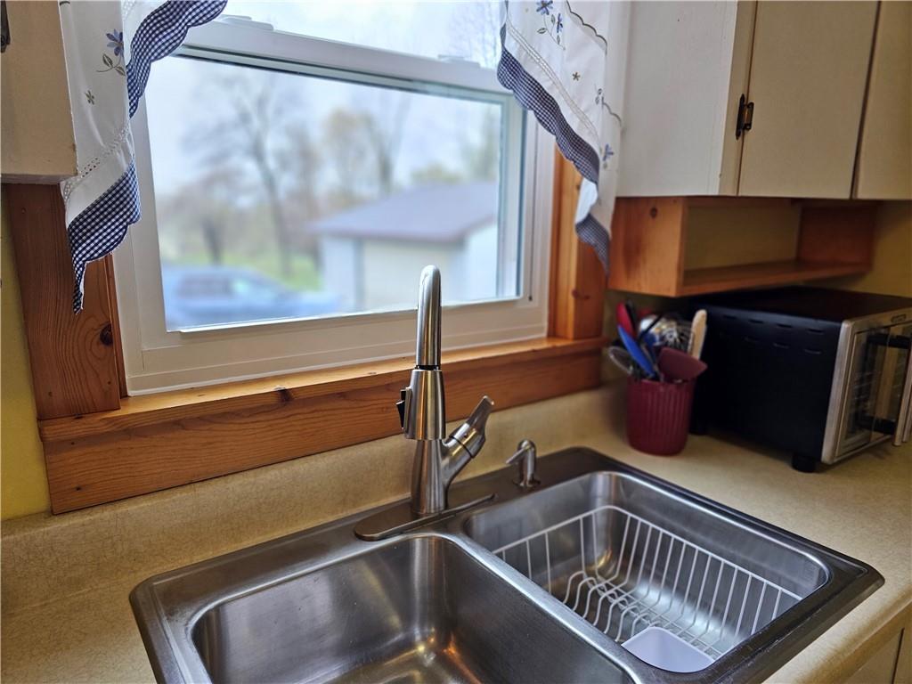 1903 Sandy Lake-Grove City Road Jackson Center, PA 16133 - Photo 6 of 24 a kitchen with a sink and a window