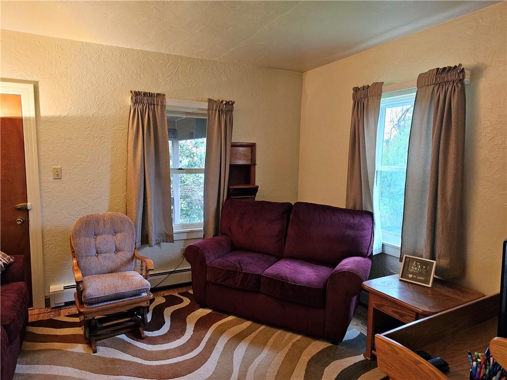 1903 Sandy Lake-Grove City Road Jackson Center, PA 16133 - Photo 7 of 24 a living room with furniture and a window