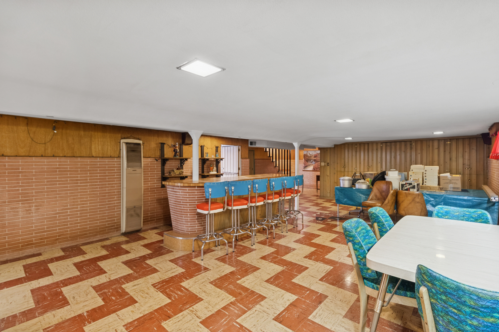 5704 North Ozark Avenue Chicago, IL 60631 - Photo 14 of 24 a living room with furniture a rug and a window