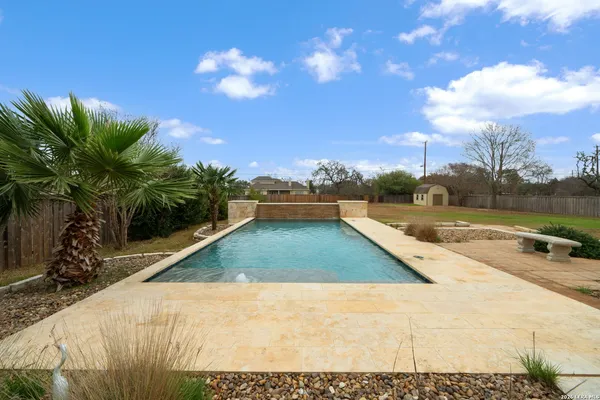 a view of backyard with green space