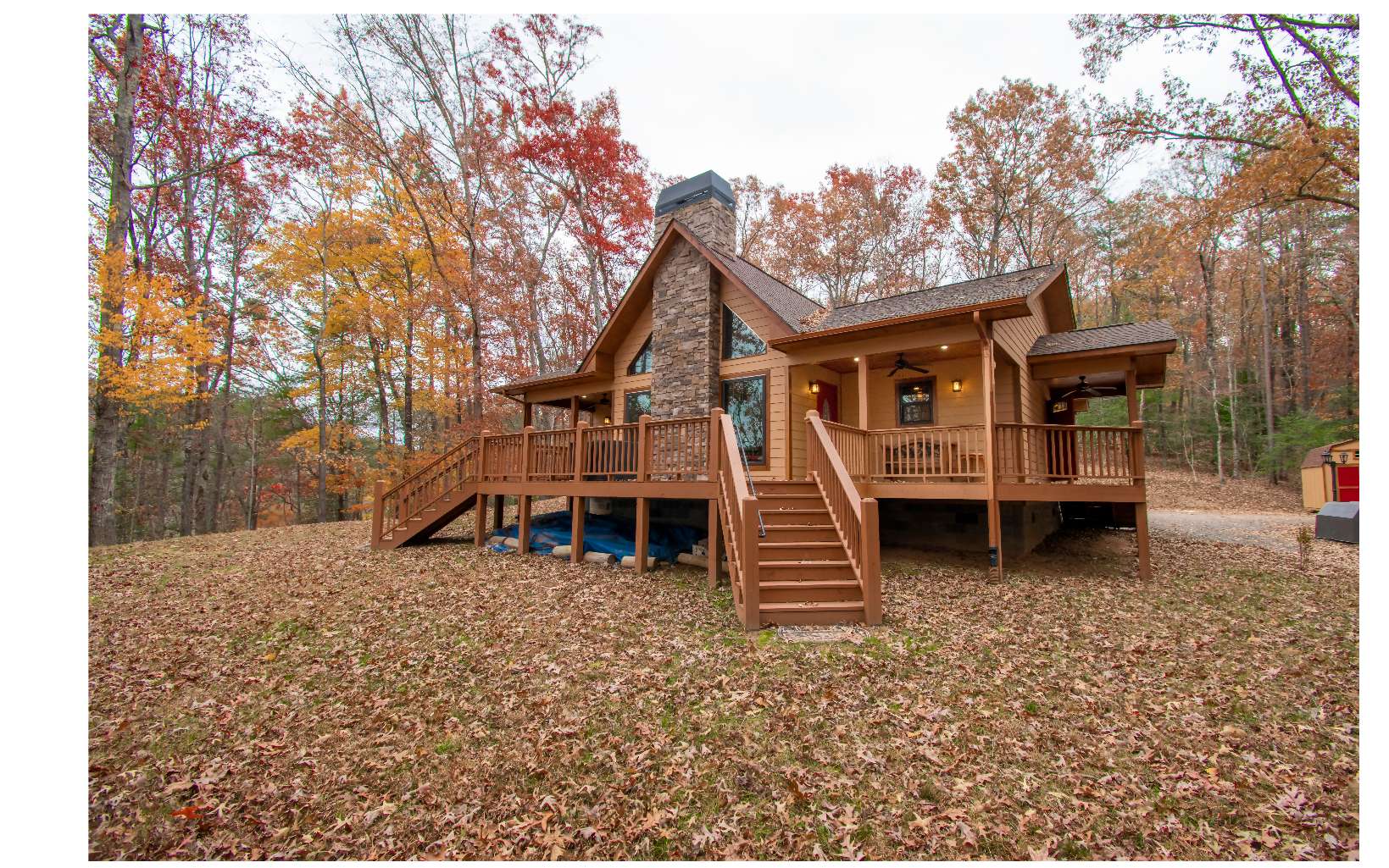 2592 Caney Creek Road Murphy, NC 28906 - Photo 1 of 1 a view of a house with a yard and sitting area