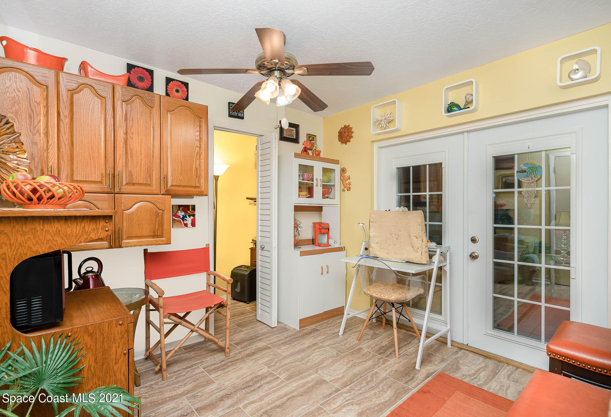 1291 Creel Road Northeast Palm Bay, FL 32905 - Photo 9 of 31 a work place with a desk and chair